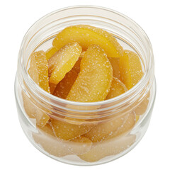 Crystallized candied lemon slices in clear jar isolated on white background