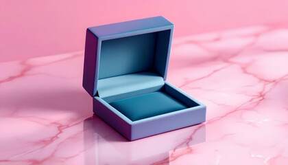 Blue jewelry gift box on pink marble background