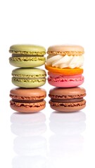 Colorful macarons stacked in pairs