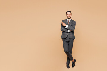 Full body young successful employee business man corporate lawyer he wear classic formal grey suit...