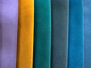 Fabric swatches in different colors, upholstery material for furniture. Samples of fabrics