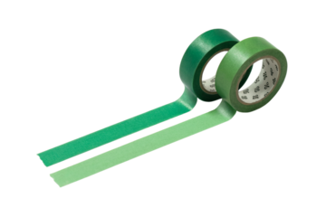 Two green tape rolls with unraveled adhesive strips isolated on white background