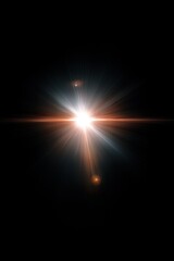 Bright starburst light effect with lens flare on black background