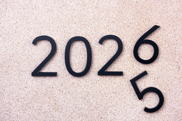 2026 Happy New Year. Black numbers 2026, 2025. Concept 2026 New Year background. 2026 greeting card. Business, resolutions, goals, inspiration, success, ideas