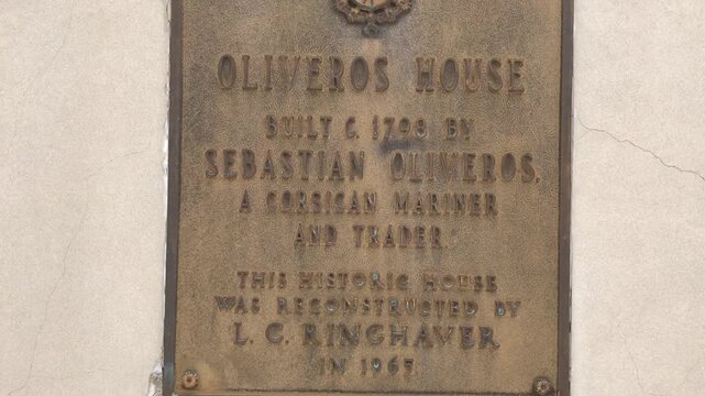 Historic plaque highlighting Oliveros House construction in 1798 by Corsican mariner Sebastian Oliveros and 1967 reconstruction in St. Augustine, Florida