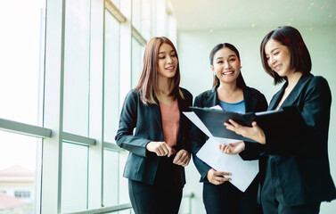 Happy teamwork among young entrepreneurs, teamwork, corporate growth goals and success in work.