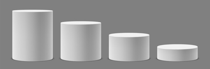 Vector collection of round white pedestals or platforms of different heights for product presentation. Realistic and minimalistic mockup or template