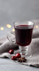 Rich mulled wine in glass, evoking Yule warmth with cranberry whispers and star anise's aromatic embrace, hygge celebration essence
