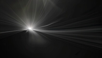 An abstract image depicting a bright, central light source radiating outwards with streaks of light against a dark background, creating a dynamic and energetic composition