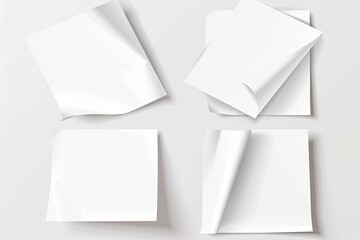 Four blank square papers, some with curled edges, displayed against a light gray background, showcasing various angles and folds