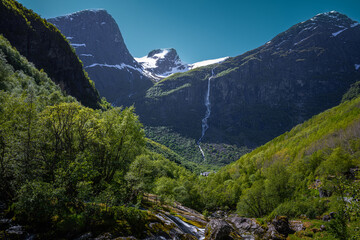 A  waterfall cascades down the mountain © Tom