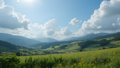 Obraz premium Sunlit Mountain Landscape with Wildflower Meadow and Rolling Hills Under Partly Cloudy Sky