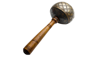 An isolated old wooden kitchen tool, a vintage rolling pin or mallet