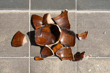 top view broken clay pot on the floor