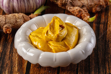 Indian yellow spicy curry sauce