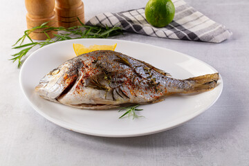 Baked dorada fish with spices
