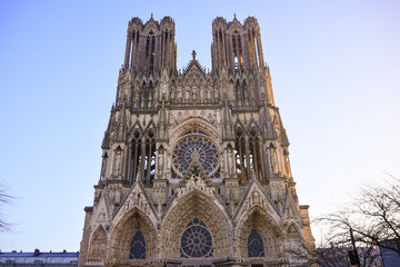 Gothic cathedral facade with rose window and twin towers © Viola
