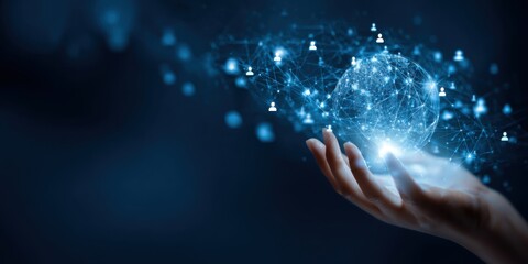 Hand holding a glowing digital globe.  Network connections and people icons