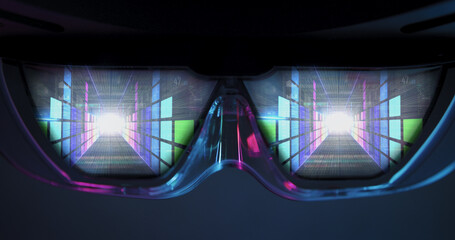 Interior view through VR glasses showing a vivid digital data tunnel with colorful light grids and bright white focal point, symbolizing cyberspace, immersive technology, and futuristic virtual journe