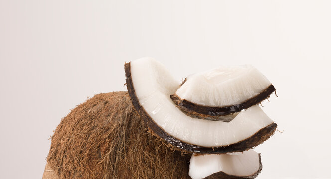 Still life of coconut shells stacked together.