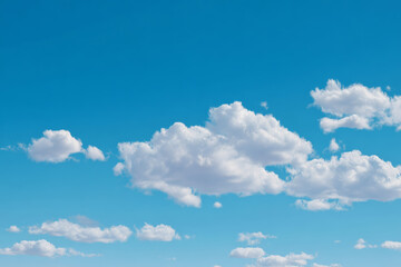 Bright Blue Sky with Fluffy White Clouds in the Clear Weather