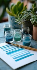 Watercolor paint swatches on a table