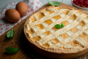 Italian crostata cake filled with ricotta cheese.