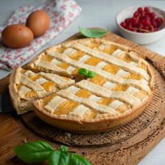 Italian crostata cake filled with ricotta cheese.