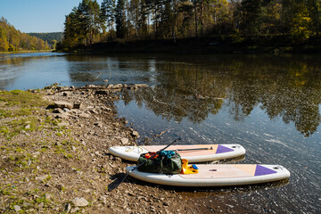 Experience a serene StandUp Paddleboarding adventure at Waters Edge, where stunning scenery allows...