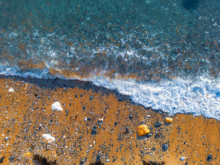 Gentle Waves Washing Over a Pebble Beach