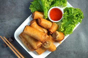 Fried spring rolls, dough stuffed with vegetables and pork