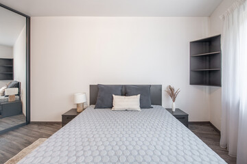 Modern Minimalist Home Bedroom with Neutral Colors and Stylish Furnishings