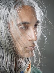 Portrait of a Middle Eastern man with long gray hair