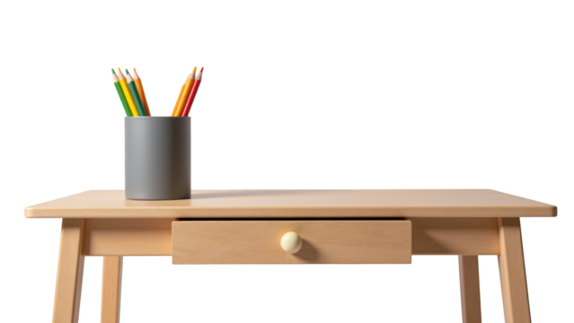 Wooden desk with drawer and gray pencil holder filled with colorful pencils, creating cozy workspace atmosphere