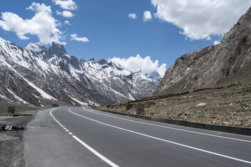 Winding Highway Through the Snow-Capped Himalayas