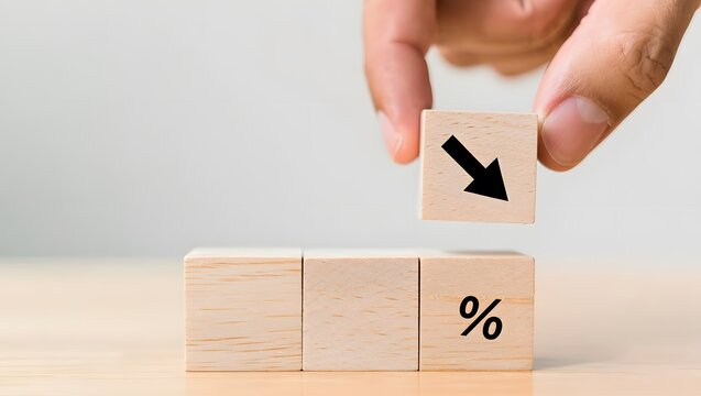 Wooden Blocks with Downward Arrow and Percent Sign Hand Adjusting