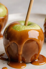 Glossy Caramel Apples on Wooden Board &ndash; Autumn Holiday Sweet Treat