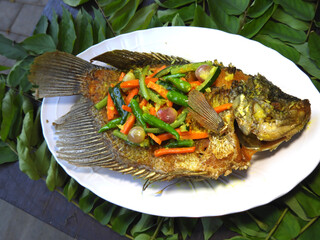 Delicious Fried Fish with Vegetables on a White Plate, Fresh Culinary Creation, Food Photography