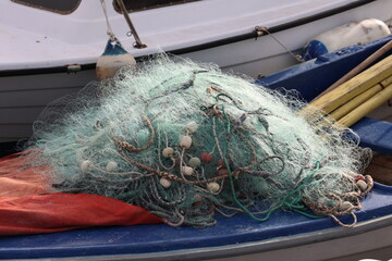 Fishing nets are lying in the boat