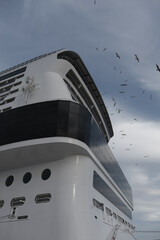 Massive Italian family cruiseship cruise ship liner Bellissima or Grandiosa in port of Palma de Mallorca, Spain during Summer Mediterranean cruising in sleek modern design