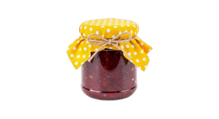 Homemade berry jam in a rustic jar adorned with a cheerful polka dot cloth and twine.