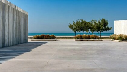 木々と青い空のある海辺の空き地