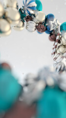 Festive 3D composition of colorful gold, teal, and silver ornaments with candy canes and stars. Perfect for New Year, Christmas cards, and holiday marketing. 3d rendering illustration not AI