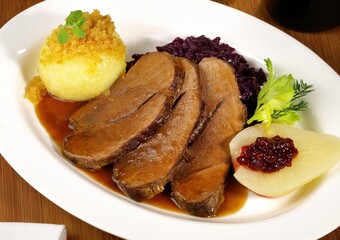 Wild Boar with Potato Dumpling and red Cabbage