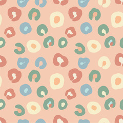 Seamless pastel leopard abstract pattern with colorful organic spots in soft peach, green, blue, and cream tones. Perfect for fabric, wallpaper, wrapping paper, and creative design projects.