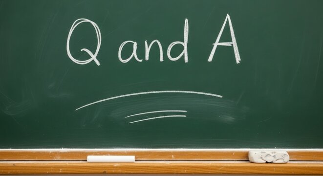 A Blackboard with Chalk Writing About Questions and Answers in a Classroom Setting