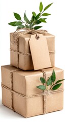 Two stacked, rustic gift boxes.  Eco-friendly wrapping, twine ties, and fresh greenery adorn the presents.  Blank tag on top