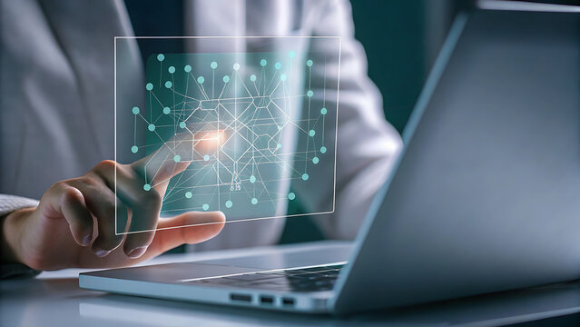 Business desk with glowing holographic big data visualization for analytics and decision making