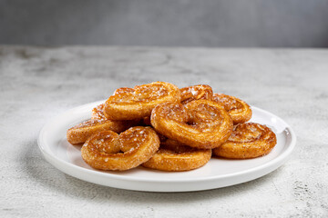 Tasty French Palmier Cookies Pastry. Palmiers or elephant ears.