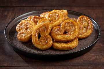 Tasty French Palmier Cookies Pastry. Palmiers or elephant ears.